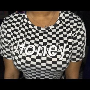 This is a white and black I would say checkerboard shirt